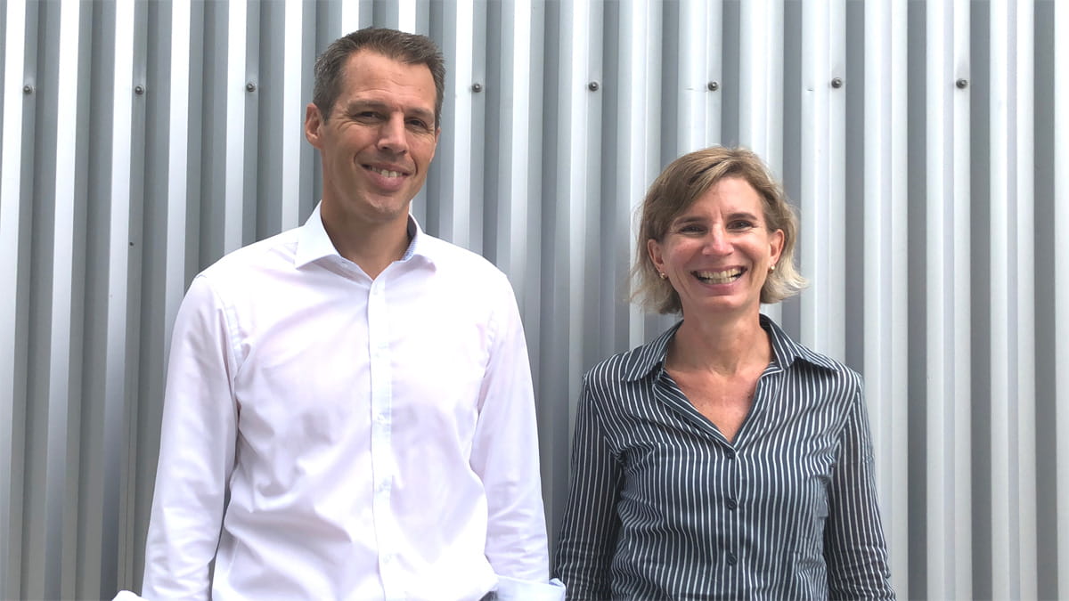 Medium close-up of the three founders of NÜWIEL, which offers smart cargo trailers for bicycles, enabling environmentally friendly last-mile delivery.
